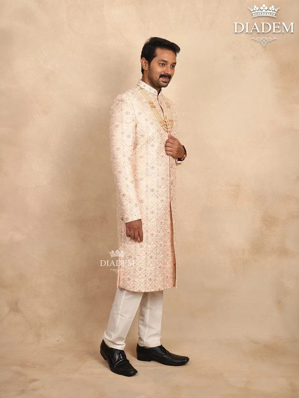 Cream Raw Silk Sherwani Suit with Floral Threadwork Embroidery, Paired with Bead Mala